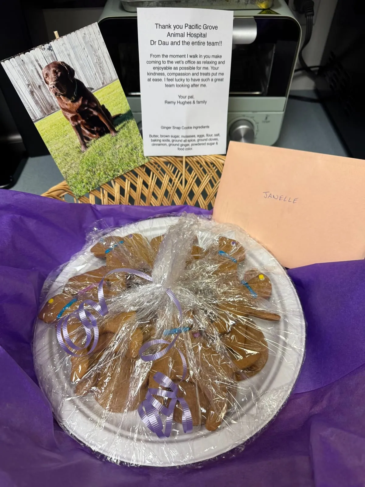 A thank-you card and tray of treats sent by a client